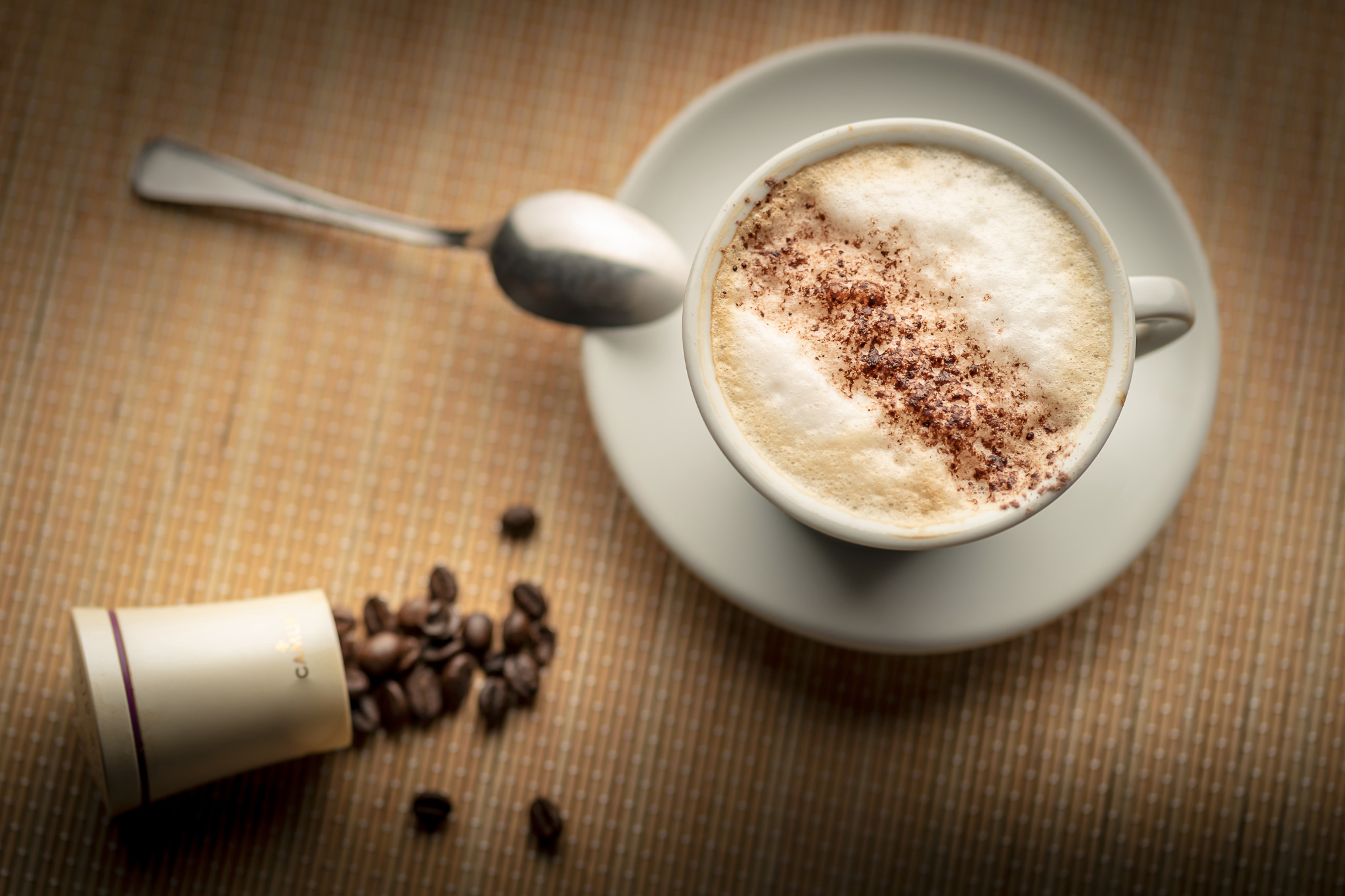 Cappuccino with coffee beans
