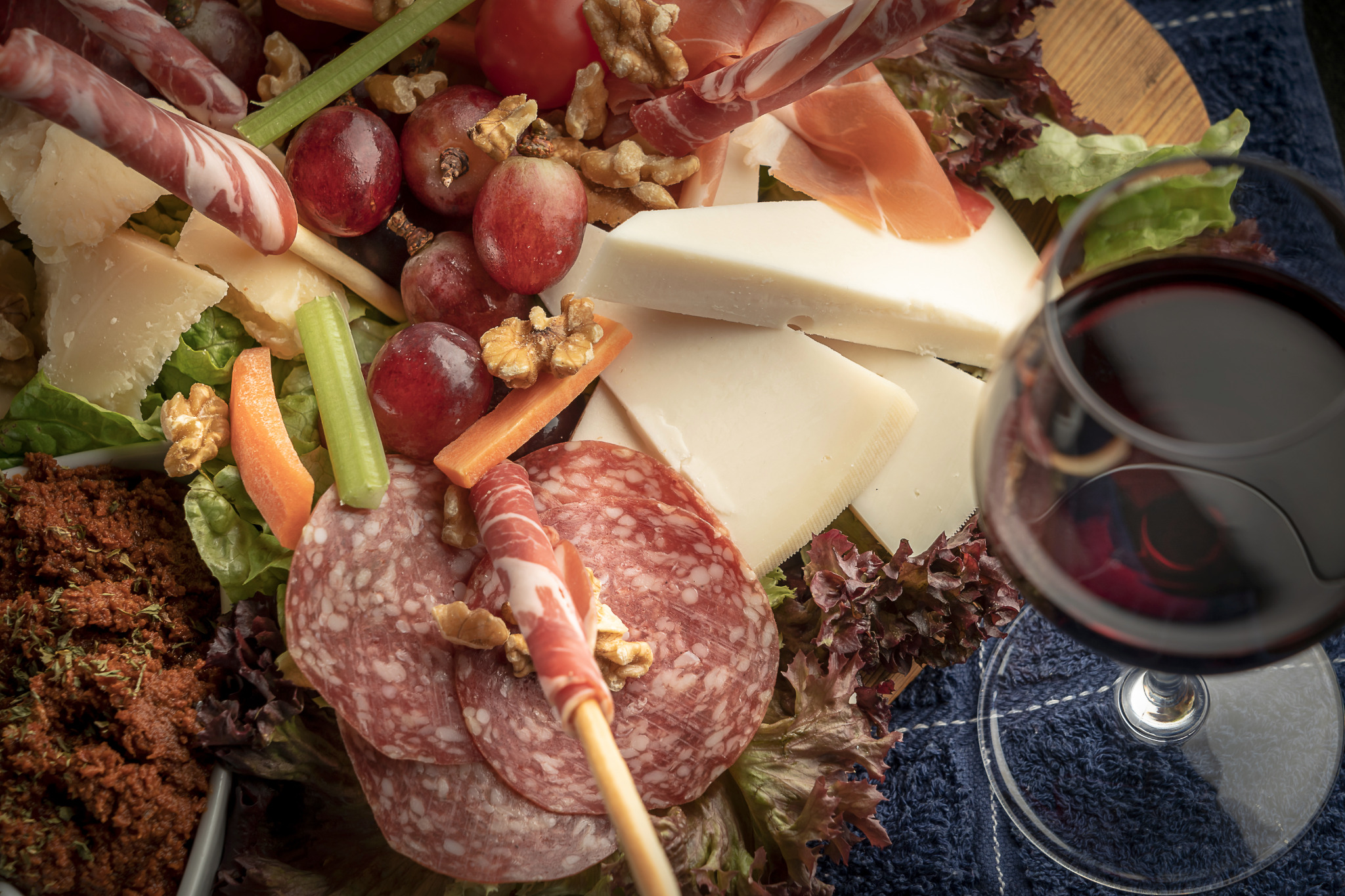 Charcuterie board with red wine