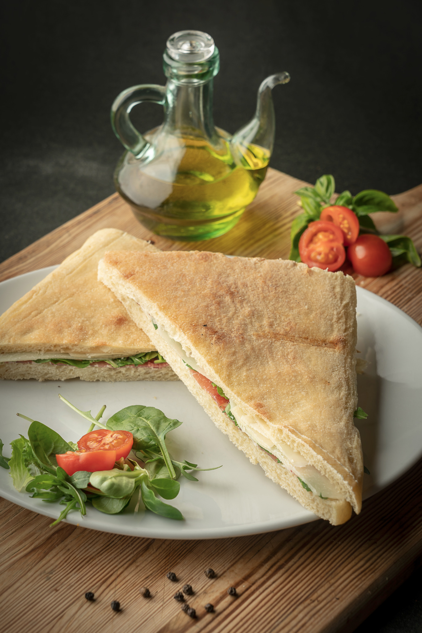 Triangle sandwich with salad garnish