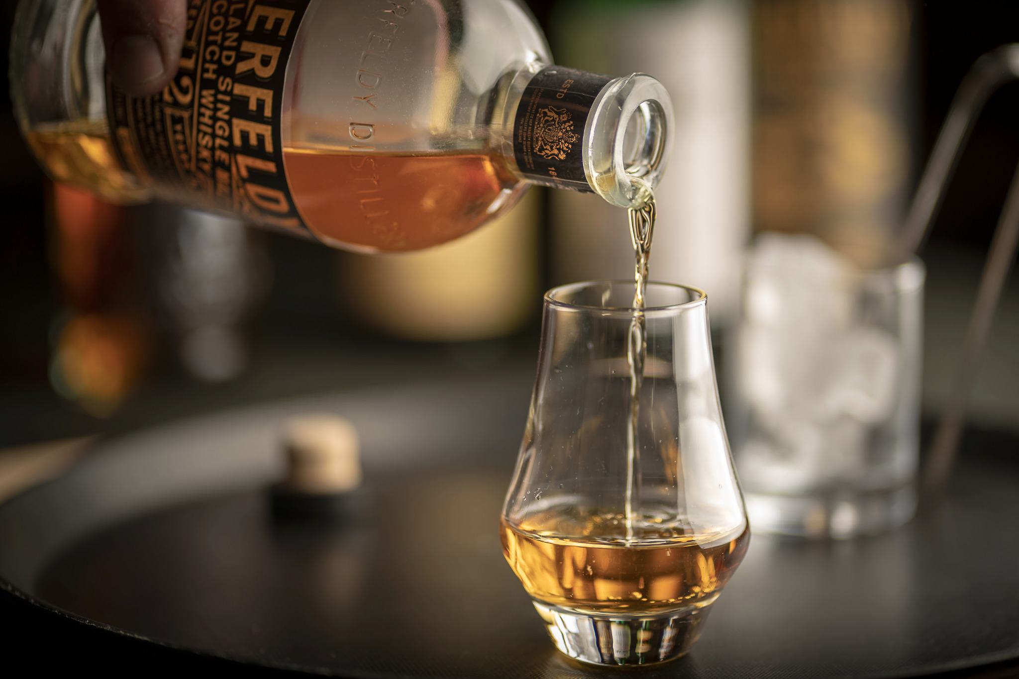Whisky being poured into a glass